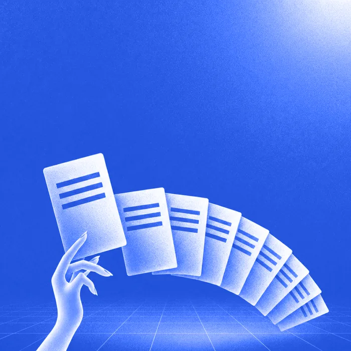 A hand fanning one template sheet out into a deck of identical copies